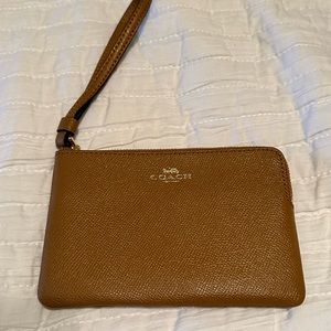 never used perfect condition coach wristlet